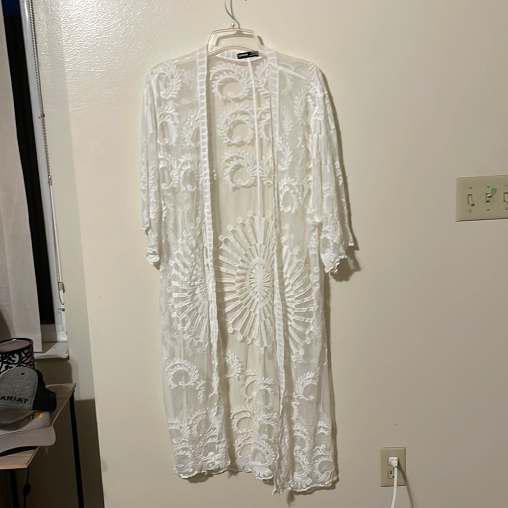 Brand new cover up. One size fits all.